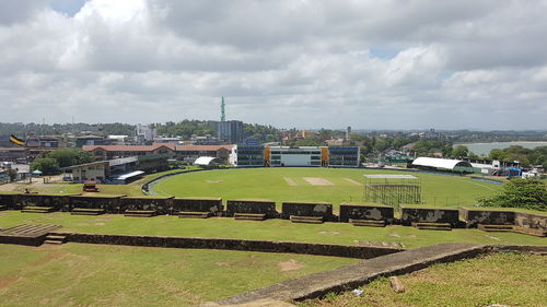 Scenic view of residential district against sky