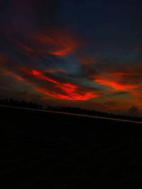 Scenic view of dramatic sky during sunset