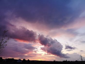 Low angle view of dramatic sky during sunset