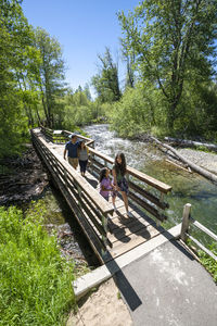 A family walks on a nature trail in south lake tahoe, ca