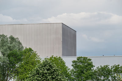 Low angle view of modern building against sky