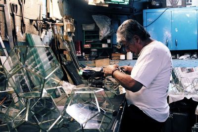 Man working in shopping mall