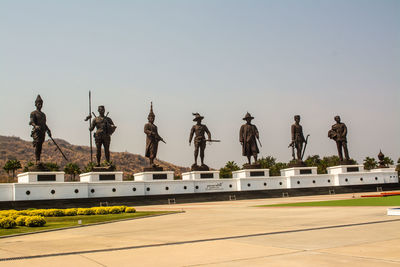 Panoramic shot of statues against clear sky
