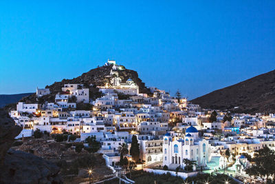 Chora in greek cyclade island of ios village at blue hour, greece