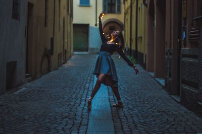 Man with umbrella in city