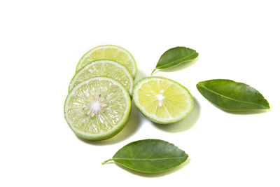 Close-up of fruits against white background