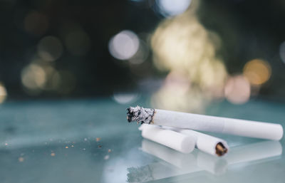 Close-up of cigarette against blurred background