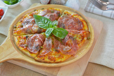 High angle view of pizza on table