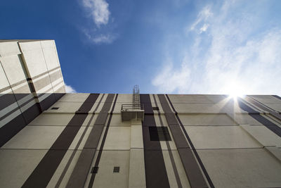 Low angle view of office building against sky