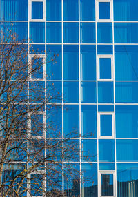 Low angle view of modern glass building