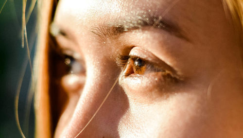 Close-up of woman looking away