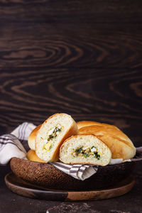 Traditional russian pies with green onion and egg. russian pirozhki, homemade baked patties.