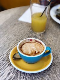 Close-up of coffee cup on table