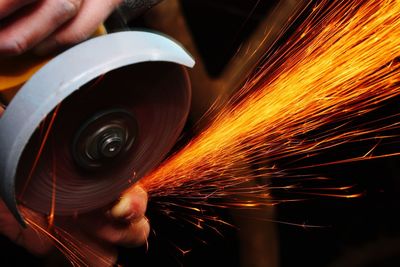 Low angle view of man working at factory