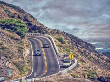 View of road against cloudy sky