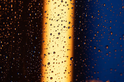 Close-up of wet glass window