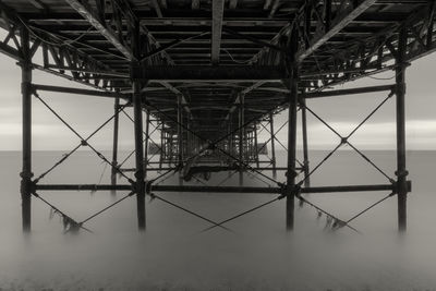 Underneath view of pier in sea