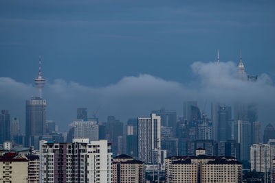 Cloudy sunset landscape over downtown kuala lumpur, malaysia.