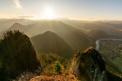 Scenic view of mountains against sky during sunset