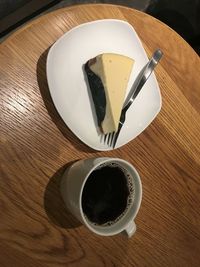 High angle view of coffee cup on table