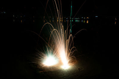 Firework display at night