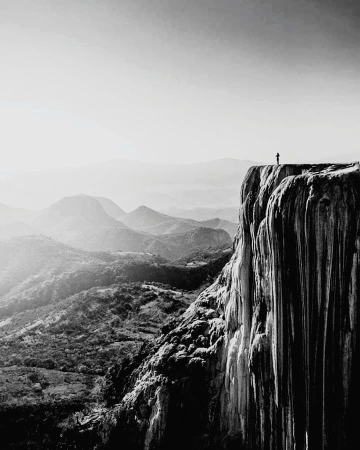 scenics - nature, mountain, sky, beauty in nature, non-urban scene, tranquil scene, day, nature, environment, tranquility, mountain range, no people, landscape, idyllic, travel, waterfall, rock, rock formation, outdoors, physical geography, formation, flowing water, power in nature