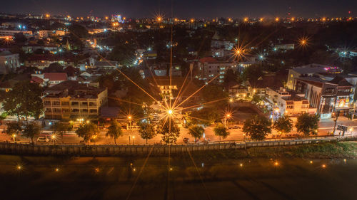 High angle view of illuminated buildings at night