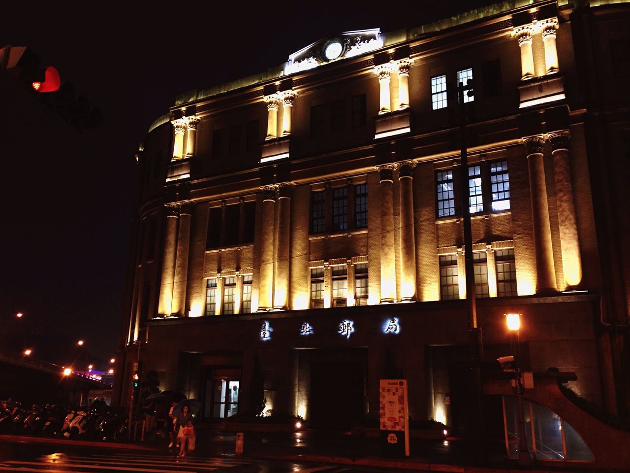 illuminated, night, building exterior, architecture, built structure, street light, street, window, building, lighting equipment, city, low angle view, sky, residential building, outdoors, facade, residential structure, transportation, no people, light - natural phenomenon