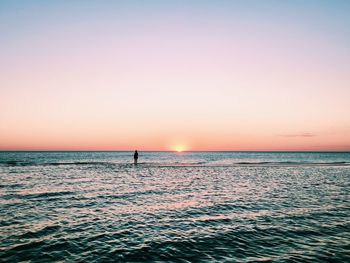 Scenic view of sea at sunset