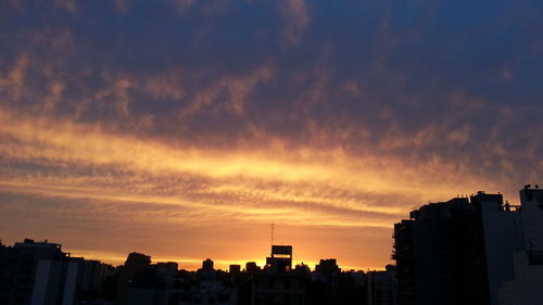 Silhouette of city at dusk