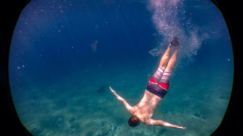 Man swimming in sea