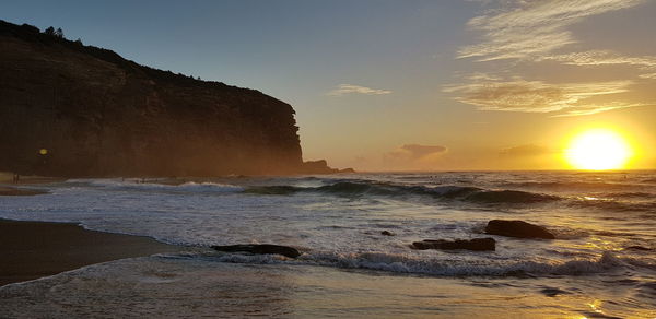 Scenic view of sea against sky during sunset