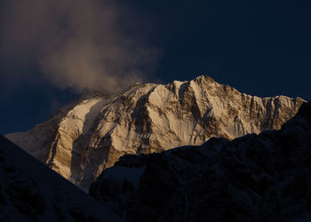 Panoramic view of mountain range against sky