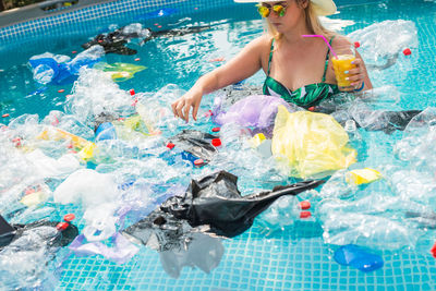 Woman swimming in pool