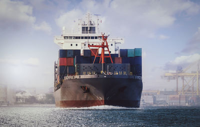 View of ship in sea against sky