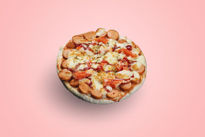 Directly above shot of pizza against white background