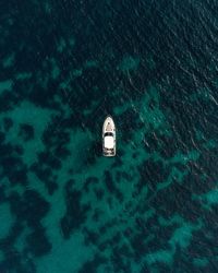 High angle view of information floating on sea