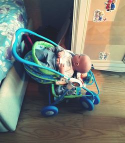 High angle view of toys on hardwood floor at home