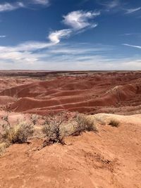 Scenic view of desert against sky