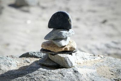 Close-up of stone stack on rock