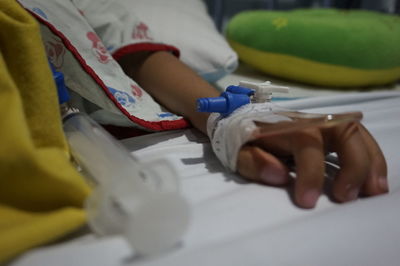 Close-up of child hand infused at the hospital