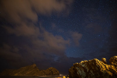 Low angle view of star field against sky at night