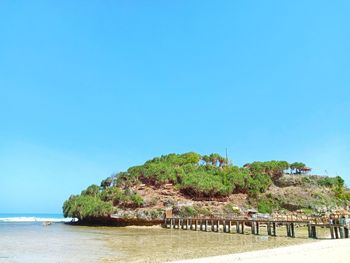 Blue sky, beach and its small island can refresh your mind