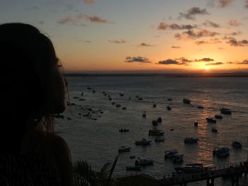 Scenic view of beach against sky during sunset