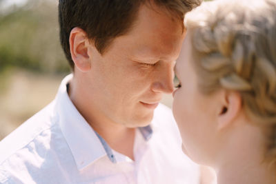 Side view of young woman looking away