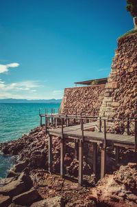 Scenic view of sea against blue sky