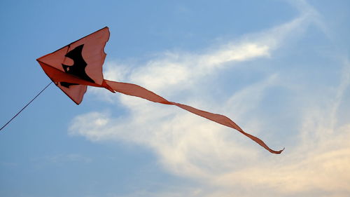 Low angle view of flag against sky