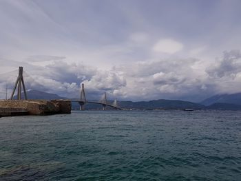 Sailboats on sea against sky