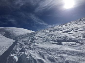 Scenic view of snow against sky