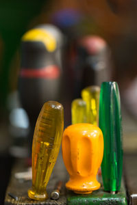 Close-up of yellow glasses on table